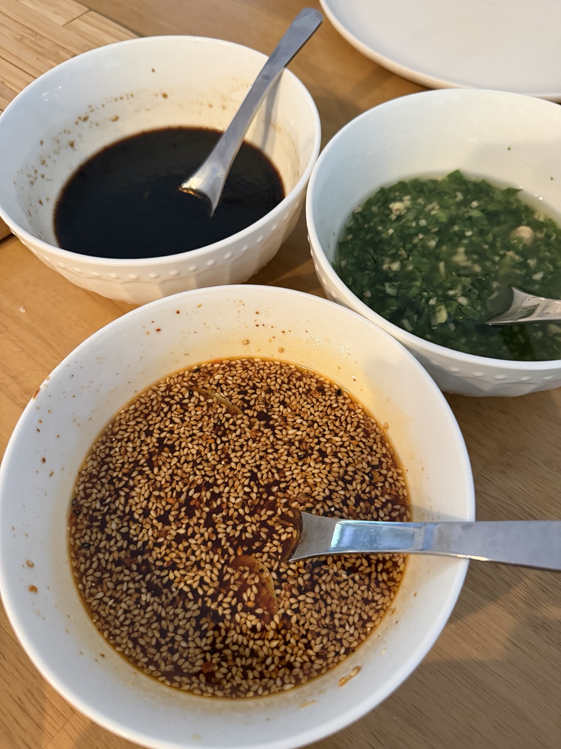 Madeline’s kitchen photo of three homemade dipping sauces in white bowls